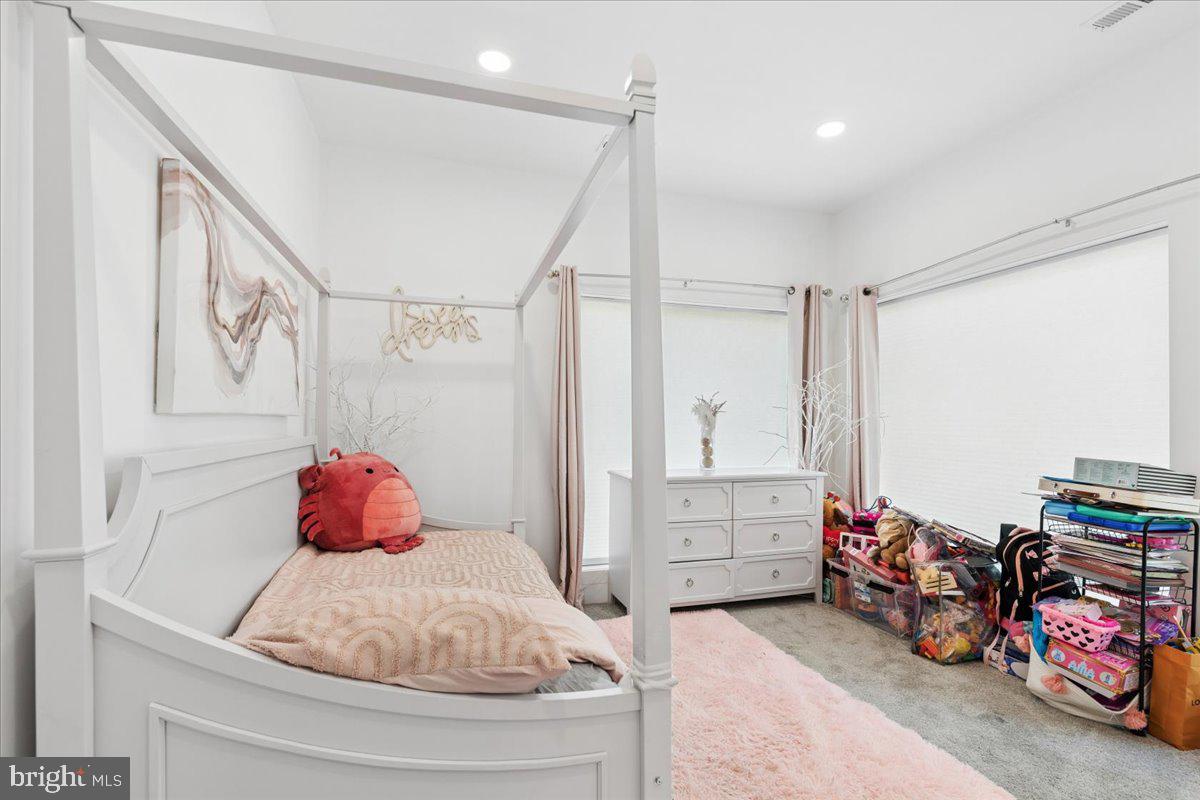3249 Arundel On The Bay Road Annapolis, MD 21403 - Photo 87 of 88 a bedroom with a bed and a window