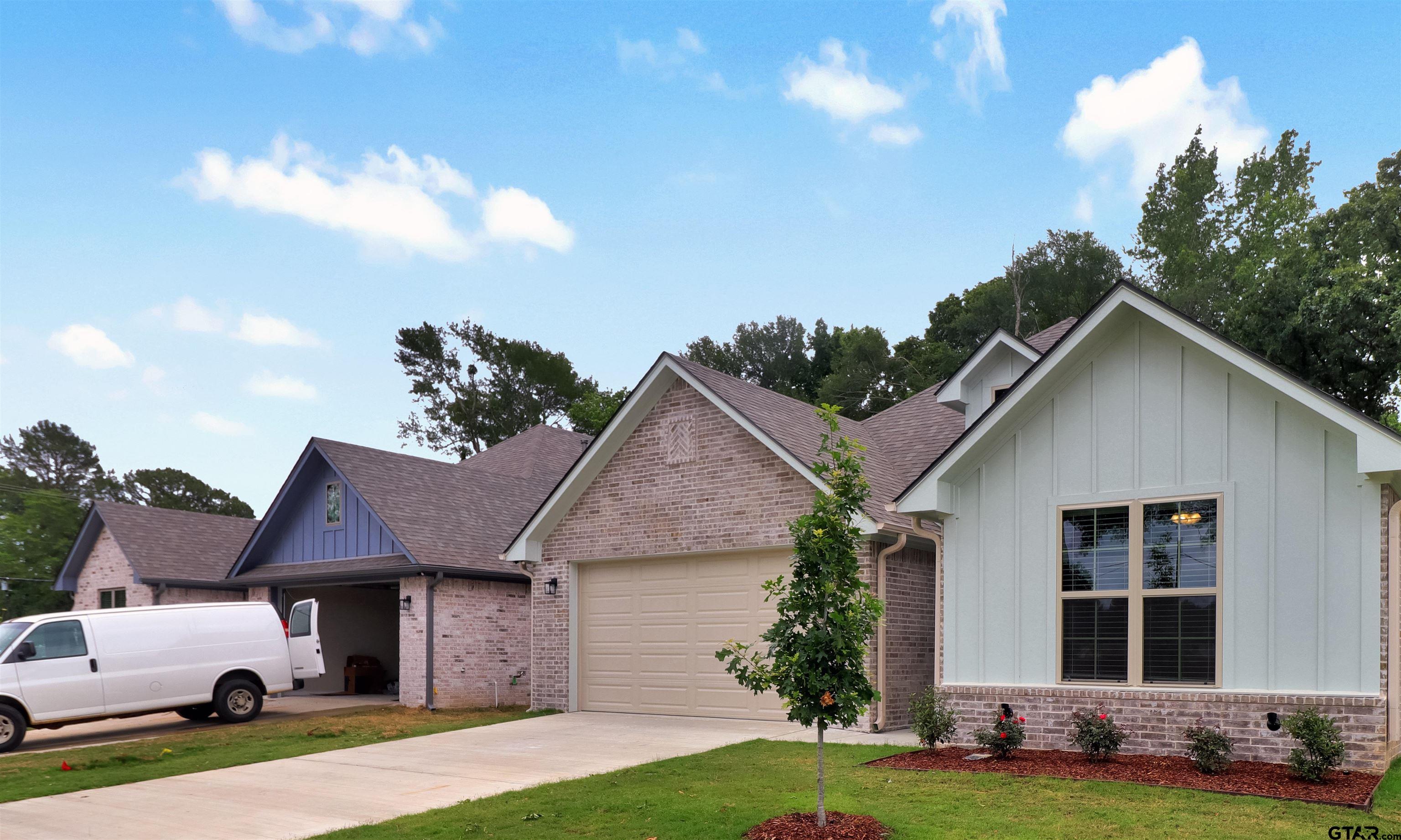 3053 Guinn Farms Road Tyler, TX 75707 - Photo 28 of 32 a view of house with yard and entertaining space