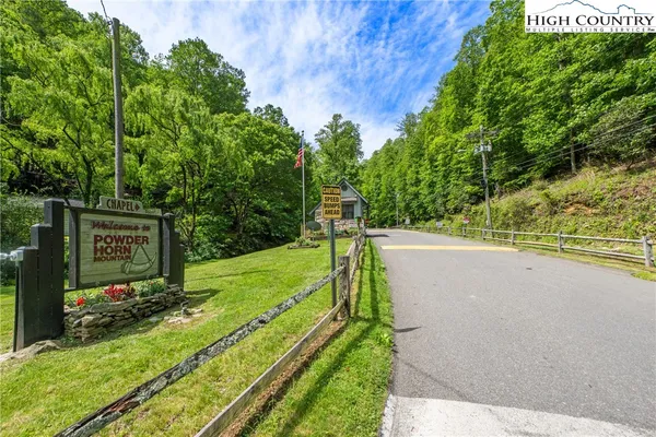 a view of a park with welcome board