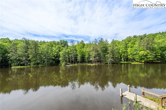 a view of a lake with a building in the background
