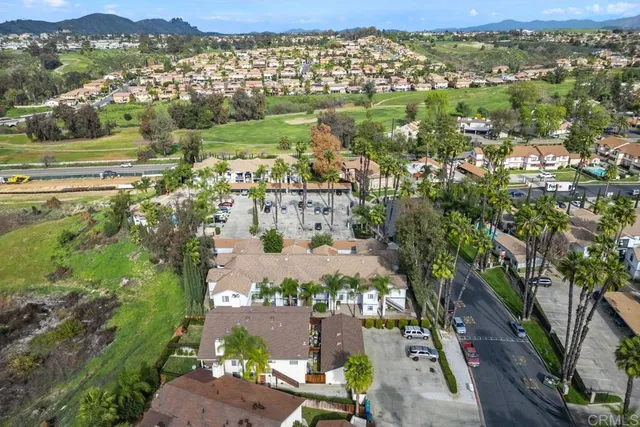 a view of city with ocean