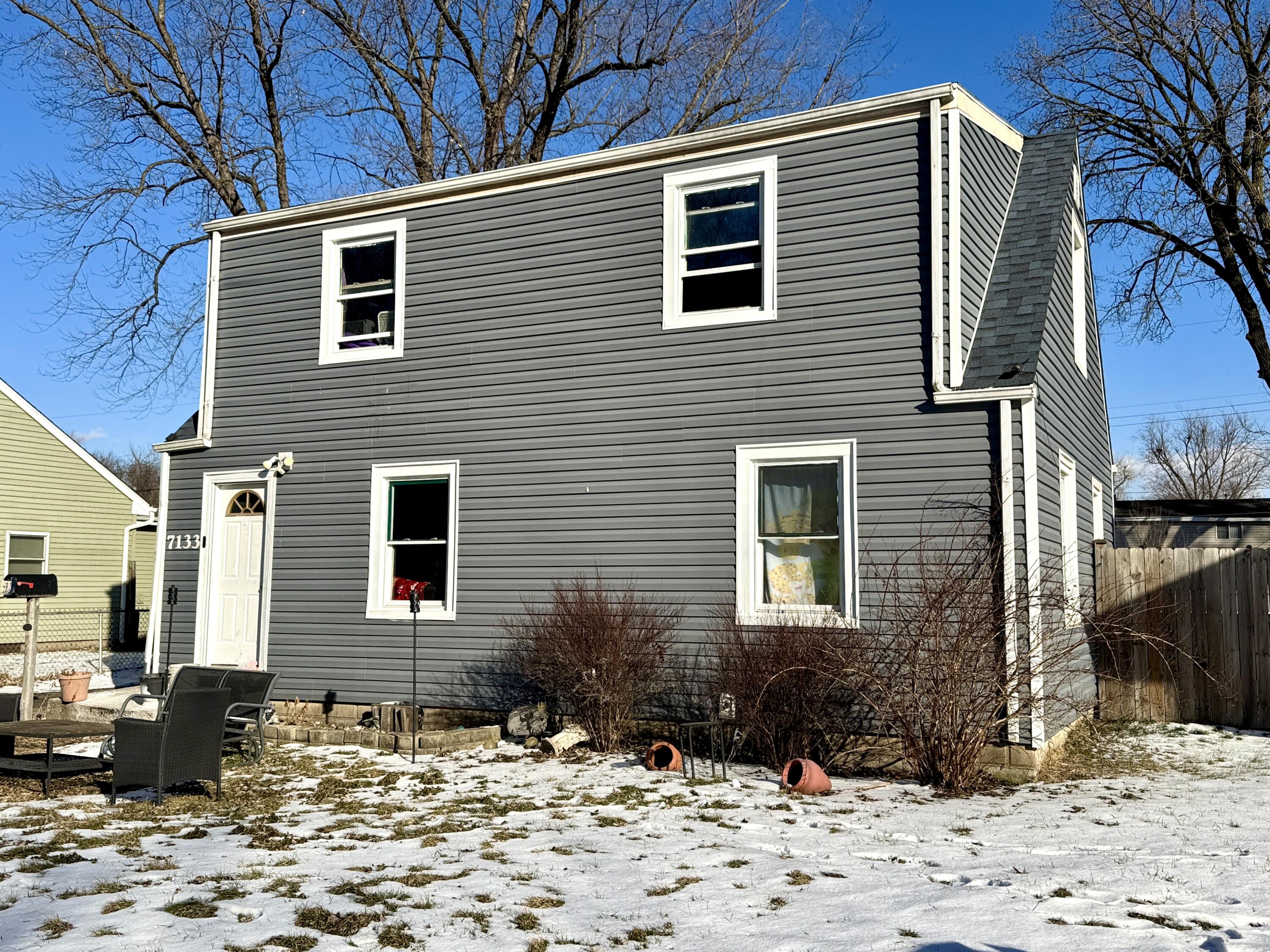 7133 Kentucky Avenue Hammond, IN 46323 - Photo 1 of 27 a view of a house with a yard