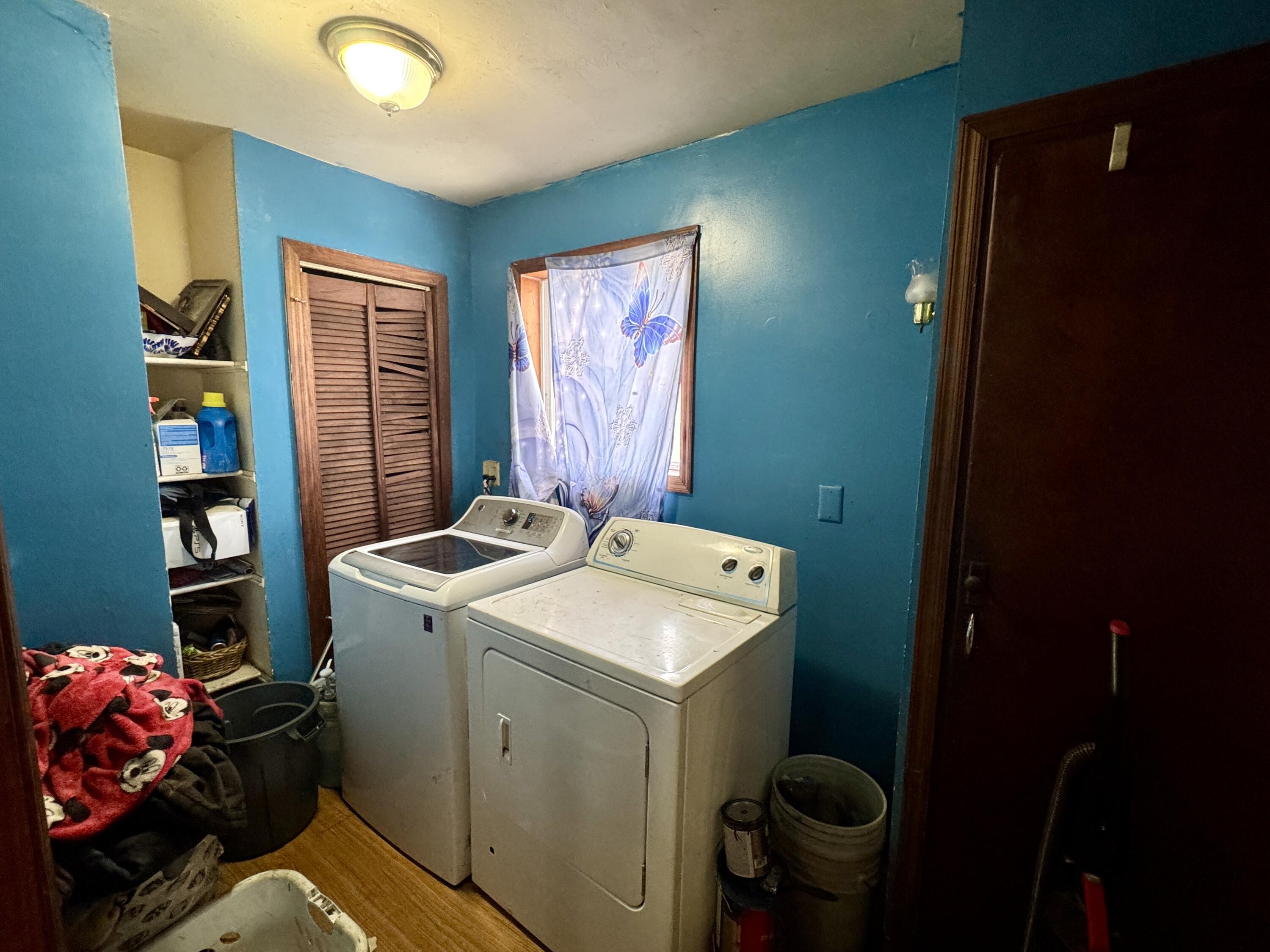 7133 Kentucky Avenue Hammond, IN 46323 - Photo 24 of 27 a view of storage and utility room with washer and dryer