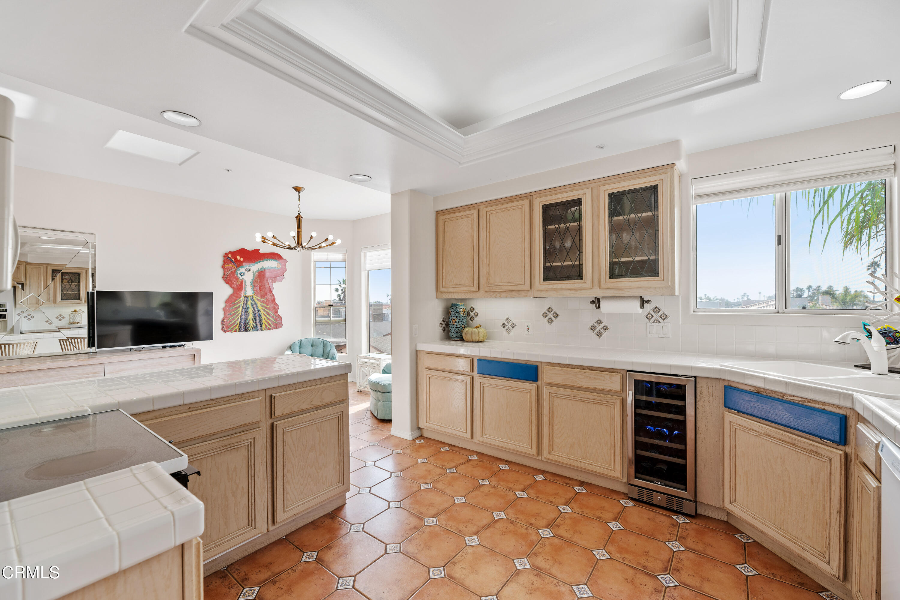 1316 Mandalay Beach Road Oxnard, CA 93035 - Photo 15 of 33 a kitchen with a sink stove and cabinets