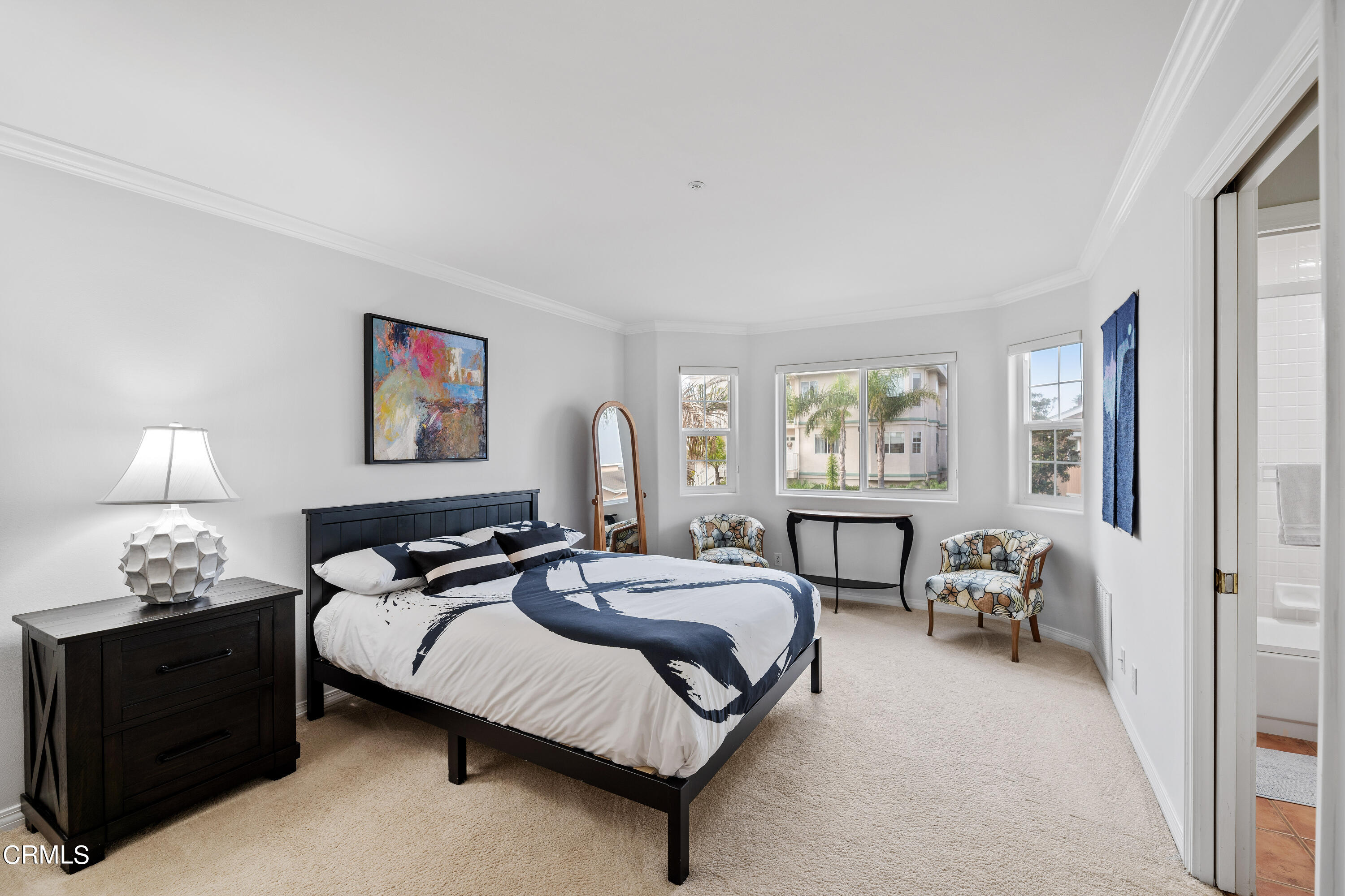 1316 Mandalay Beach Road Oxnard, CA 93035 - Photo 20 of 33 a bedroom with a bed and walk in closet