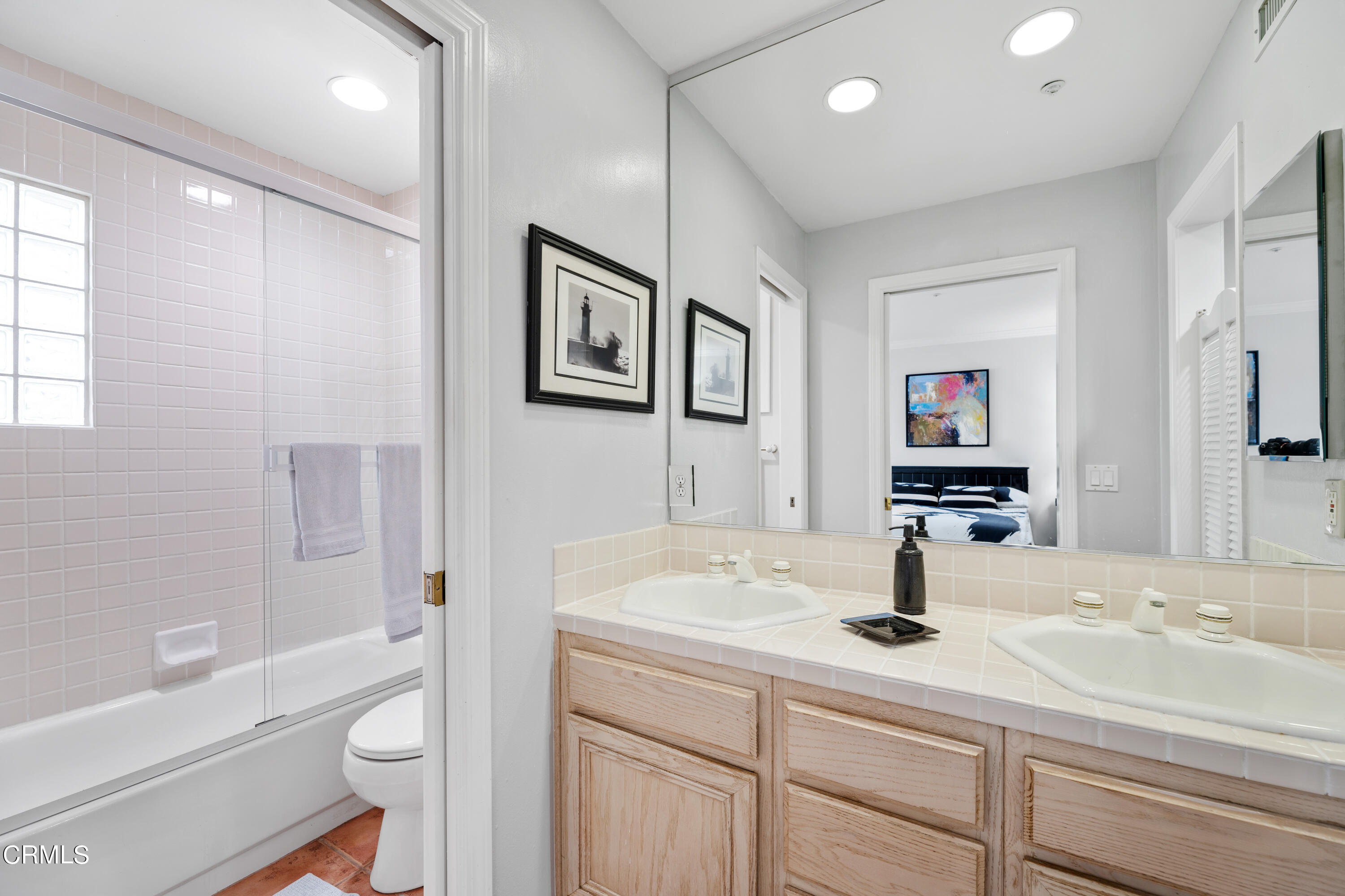1316 Mandalay Beach Road Oxnard, CA 93035 - Photo 22 of 33 a bathroom with a sink a toilet and shower