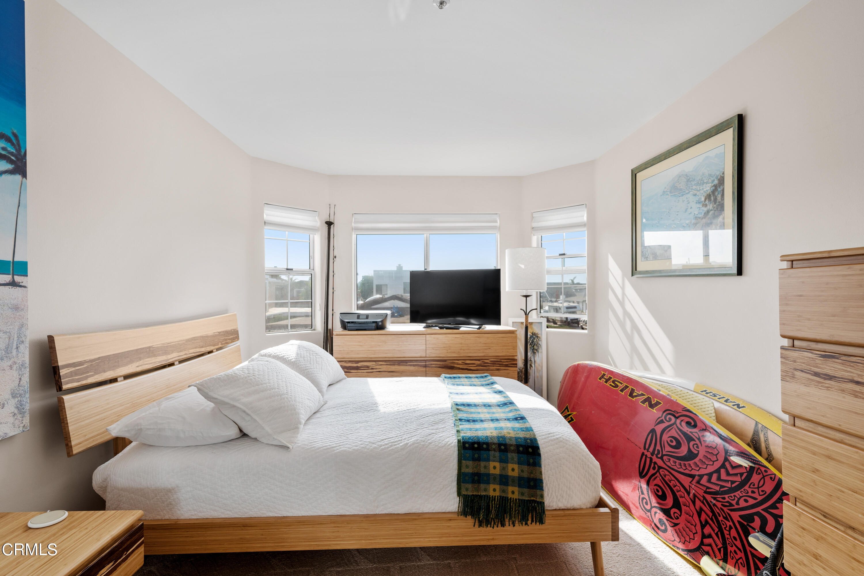 1316 Mandalay Beach Road Oxnard, CA 93035 - Photo 25 of 33 a bedroom with a bed and a flat screen tv