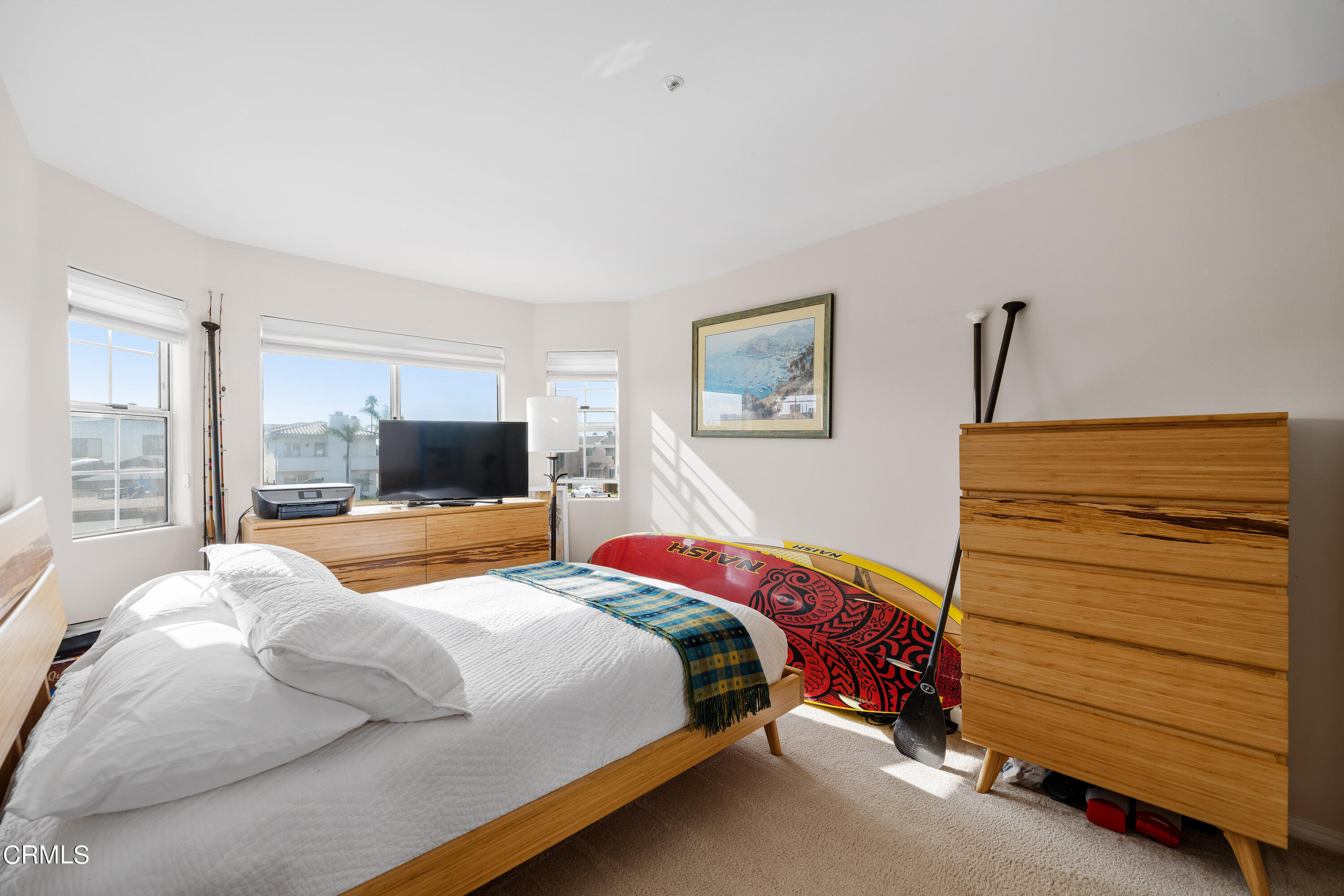 1316 Mandalay Beach Road Oxnard, CA 93035 - Photo 26 of 33 a bedroom with a bed and a flat screen tv