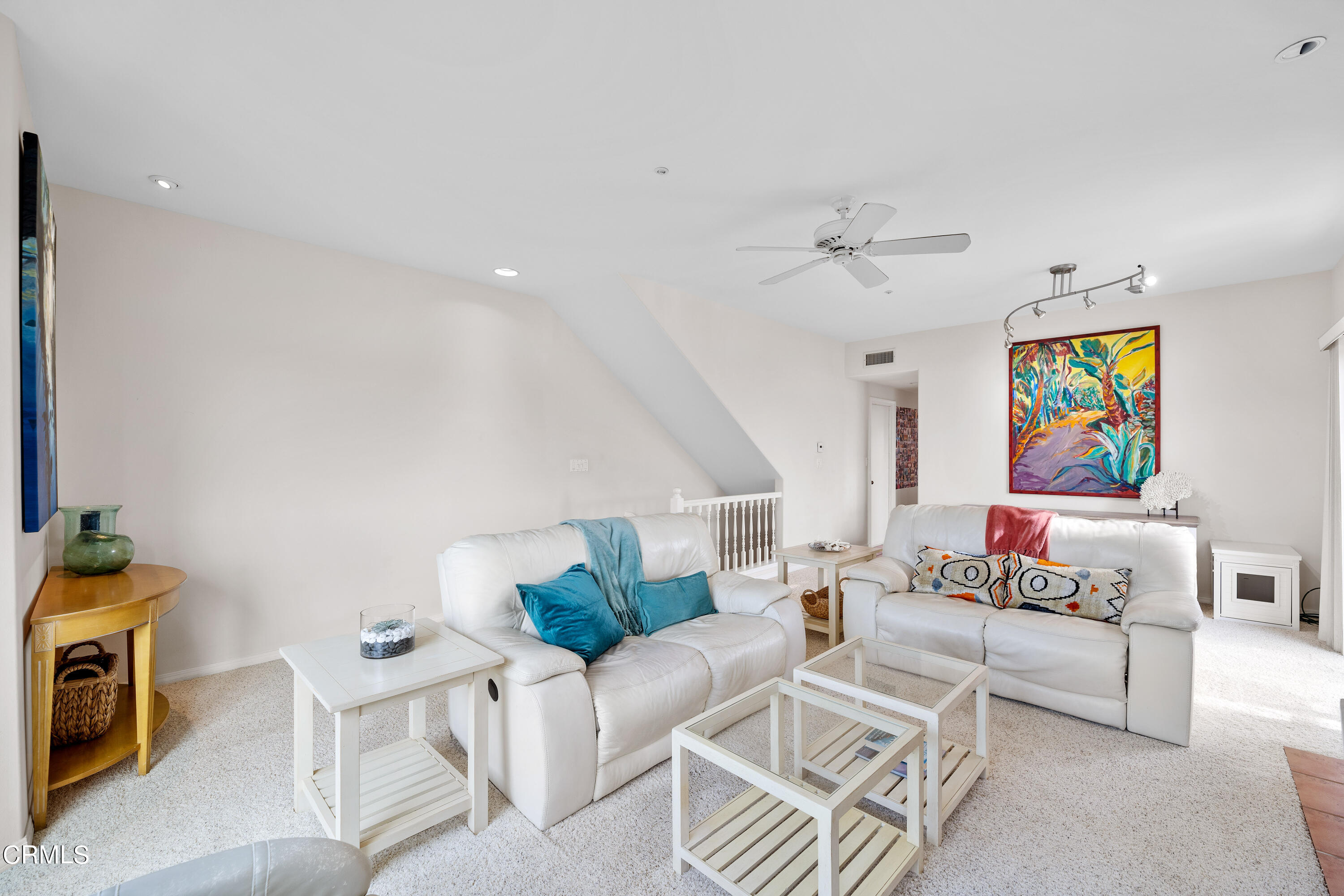 1316 Mandalay Beach Road Oxnard, CA 93035 - Photo 8 of 33 a living room with furniture and a flat screen tv