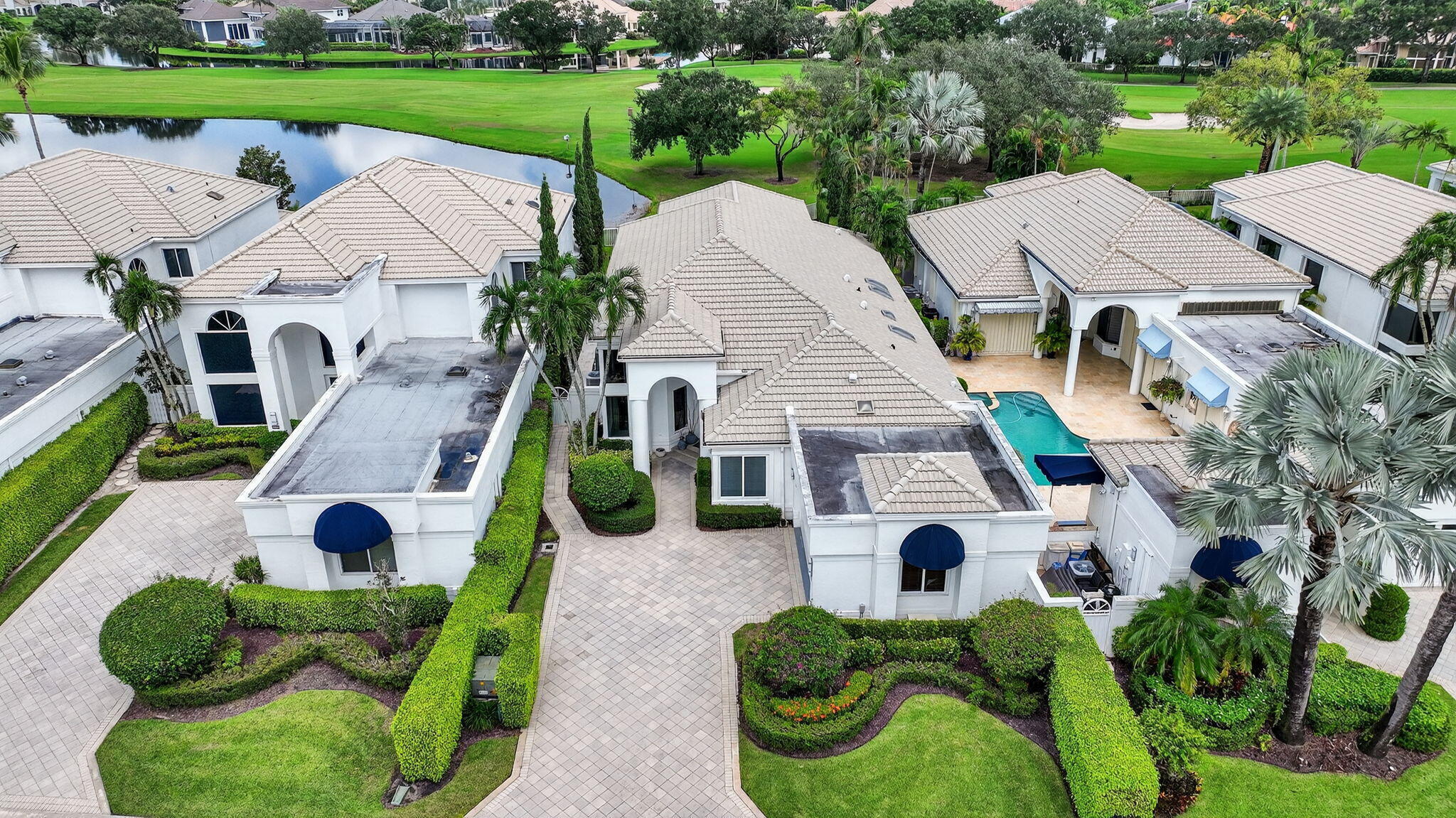 2563 Northwest 63rd Street Boca Raton, FL 33496 - Photo 55 of 65 an aerial view of a house with garden space and street view