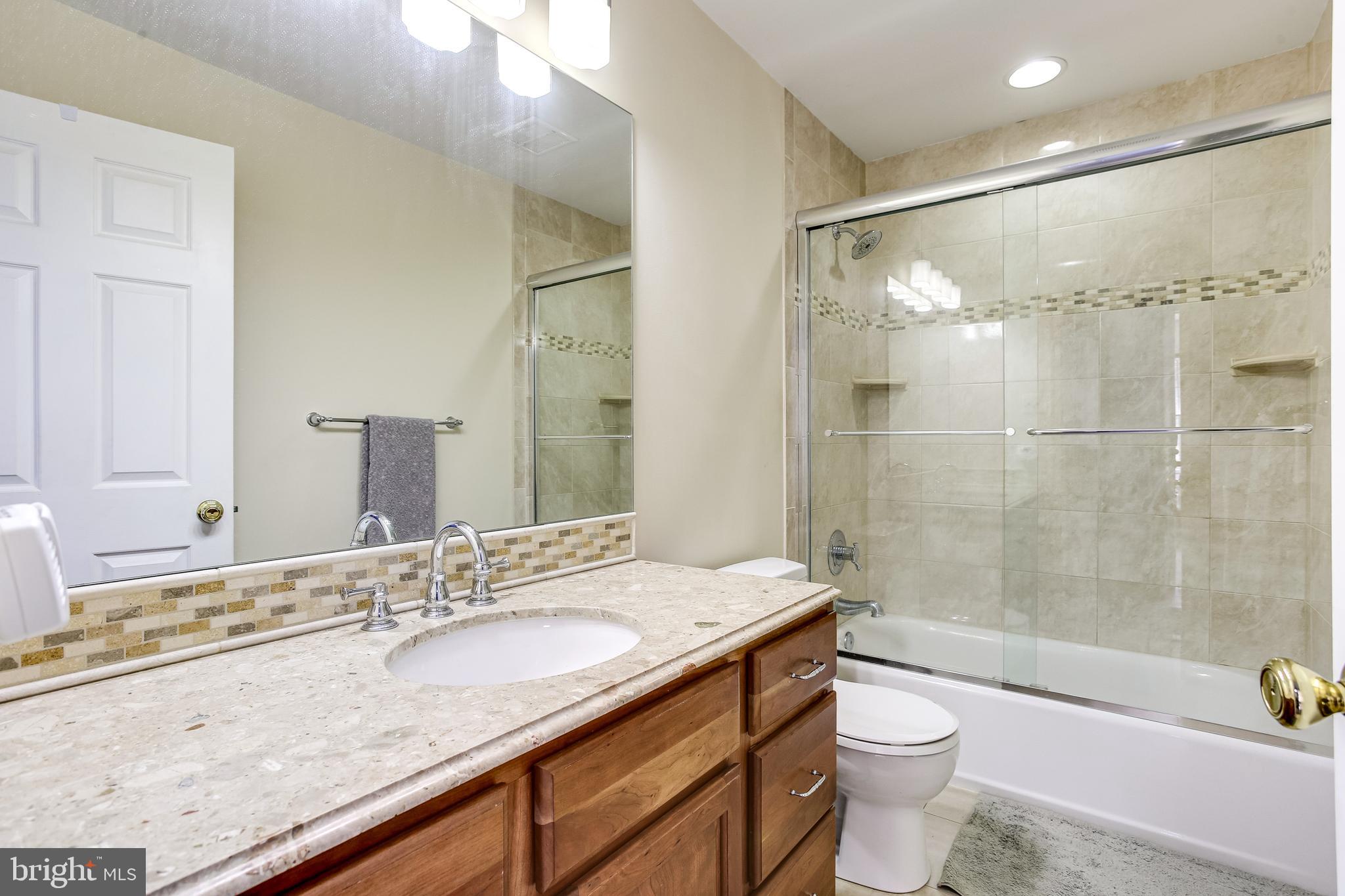 10432 Stansfield Road Laurel, MD 20723 - Photo 25 of 32 Full bathroom on upper level hallway