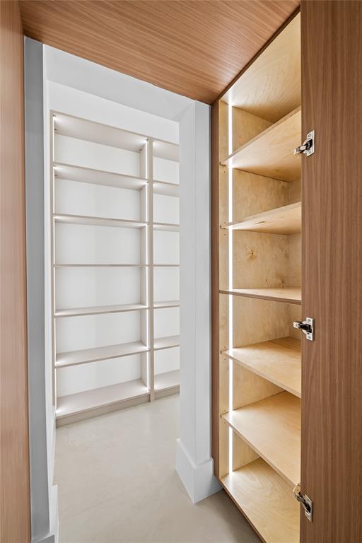 1717 Northeast 17th Terrace Fort Lauderdale, FL 33305 - Photo 16 of 40 a view of an empty walk in closet