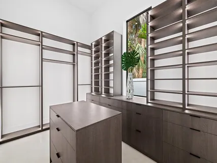 a kitchen with a refrigerator and a sink