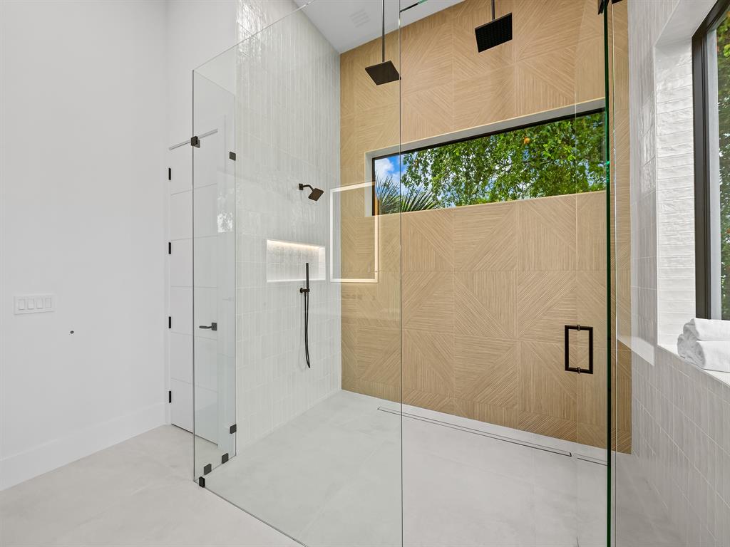 1717 Northeast 17th Terrace Fort Lauderdale, FL 33305 - Photo 29 of 40 a bathroom with a shower