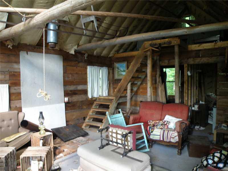 105 Vulner Road Dover-Foxcroft, ME 04426 - Photo 8 of 11 Living Room. Cathedral ceilings,...