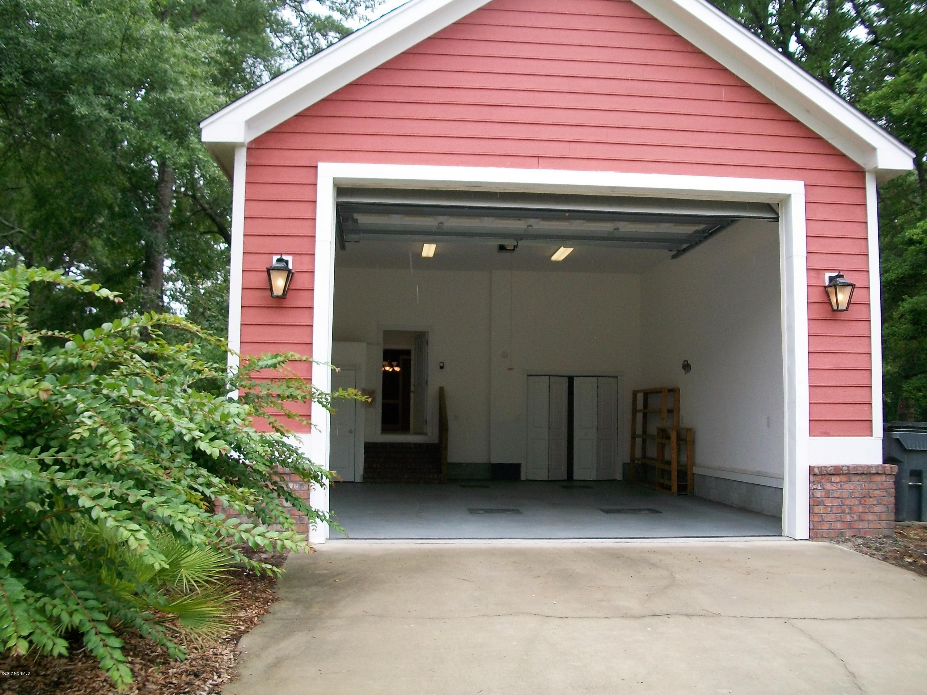 9212 Horseshoe Lake Road Southwest Calabash, NC 28467 - Photo 3 of 40 14' Door and 16' Ceilings in this Garage!