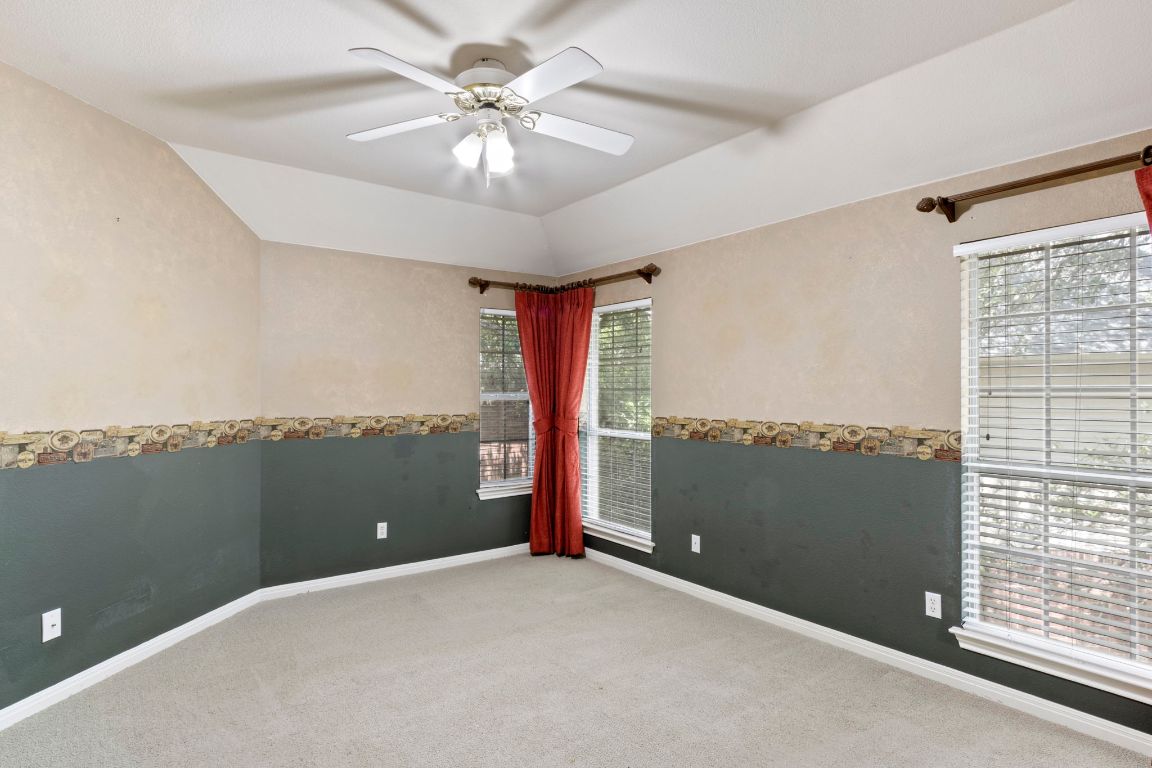 9501 Aire Libre Drive Austin, TX 78726 - Photo 22 of 38 a view of a room with furniture window and ceiling fan