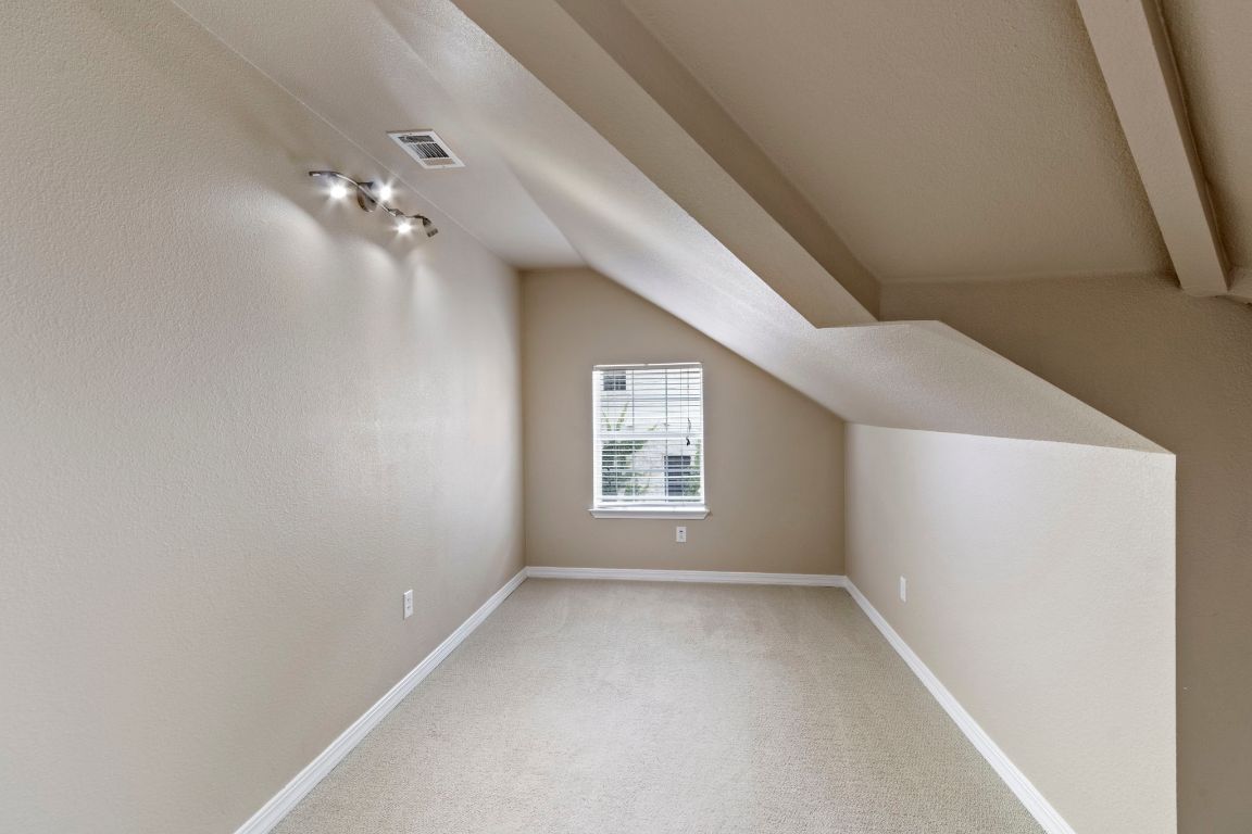 9501 Aire Libre Drive Austin, TX 78726 - Photo 30 of 38 a view of empty room with windows
