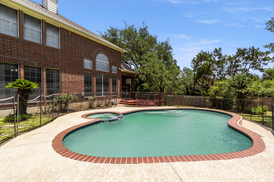 9501 Aire Libre Drive Austin, TX 78726 - Photo 33 of 38 a view of a house with swimming pool