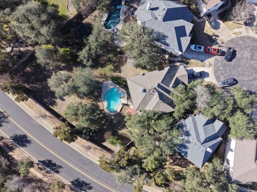 9501 Aire Libre Drive Austin, TX 78726 - Photo 37 of 38 an aerial view of a house with a yard