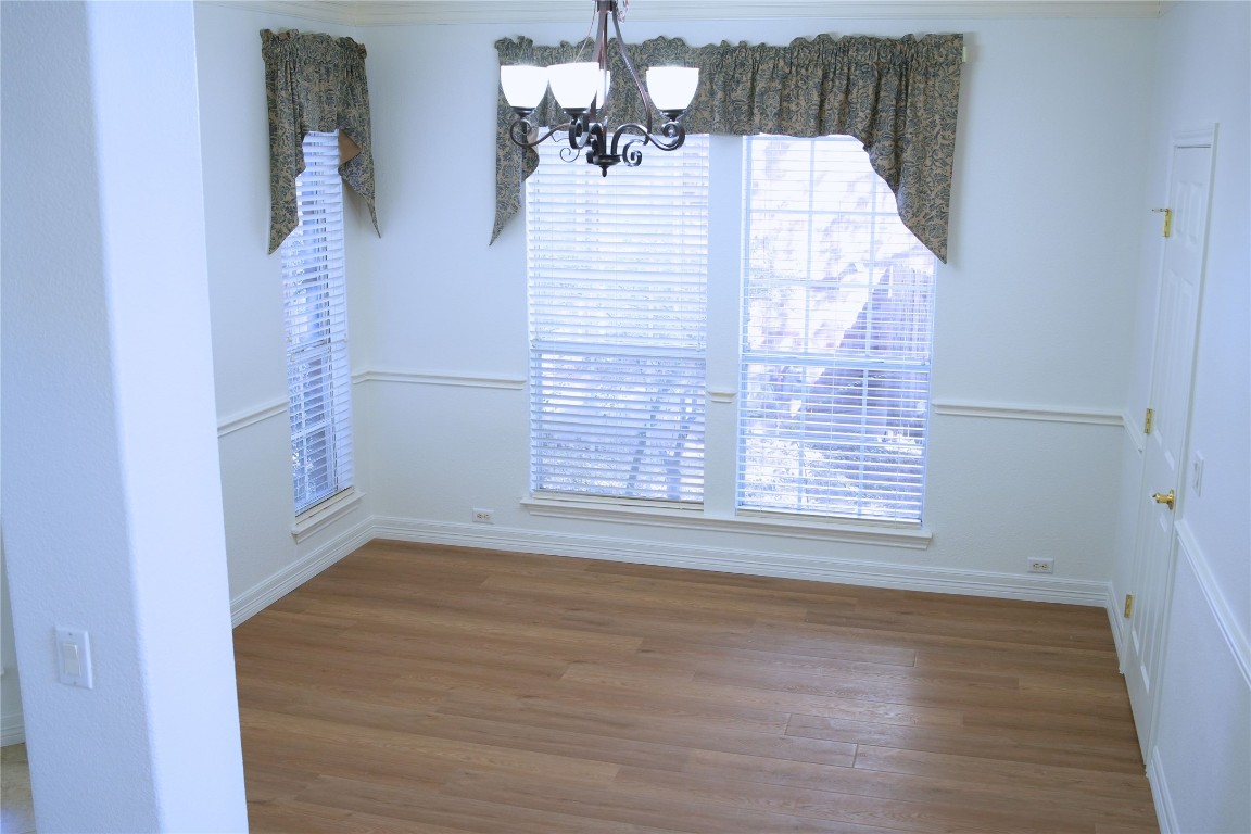 9501 Aire Libre Drive Austin, TX 78726 - Photo 8 of 38 a view of empty room with wooden floor