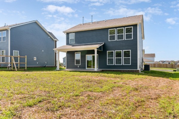 1037 Ewell Farm Drive Spring Hill, TN 37174 - Photo 24 of 31 a front view of a house with a garden