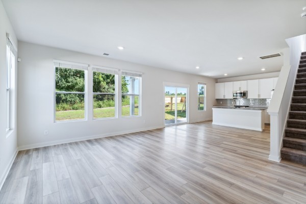 1037 Ewell Farm Drive Spring Hill, TN 37174 - Photo 7 of 31 a view of empty room with wooden floor and window