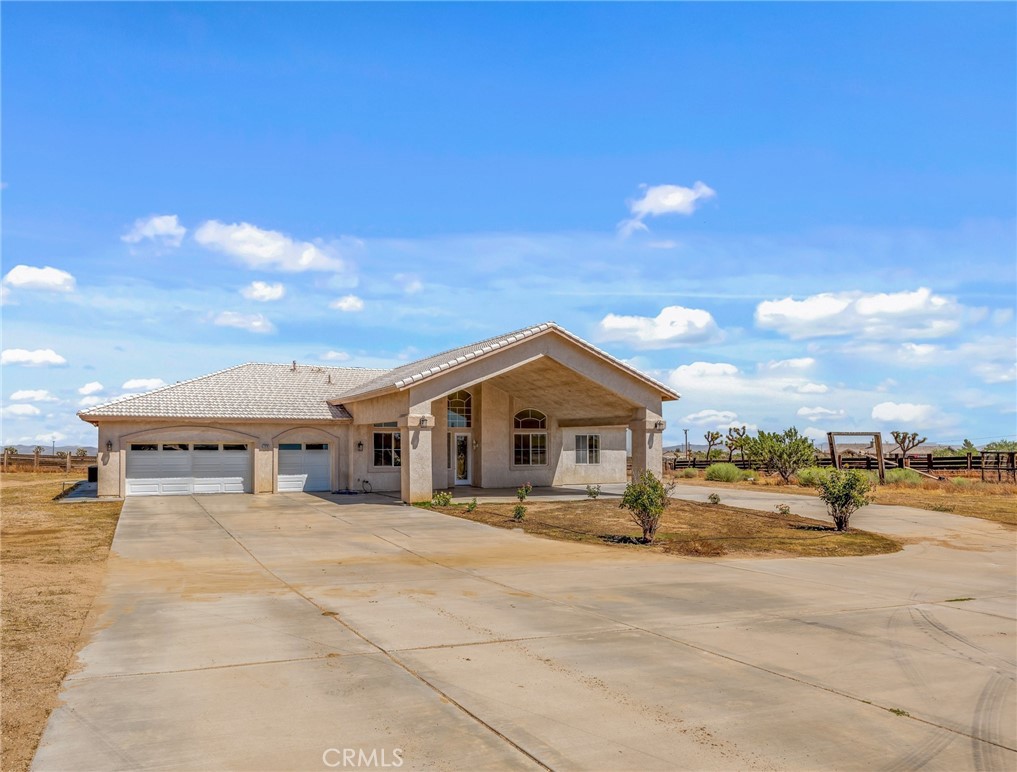 7326 Del Rosa Road Phelan, CA 92371 - Photo 1 of 1 a view of a house with a patio