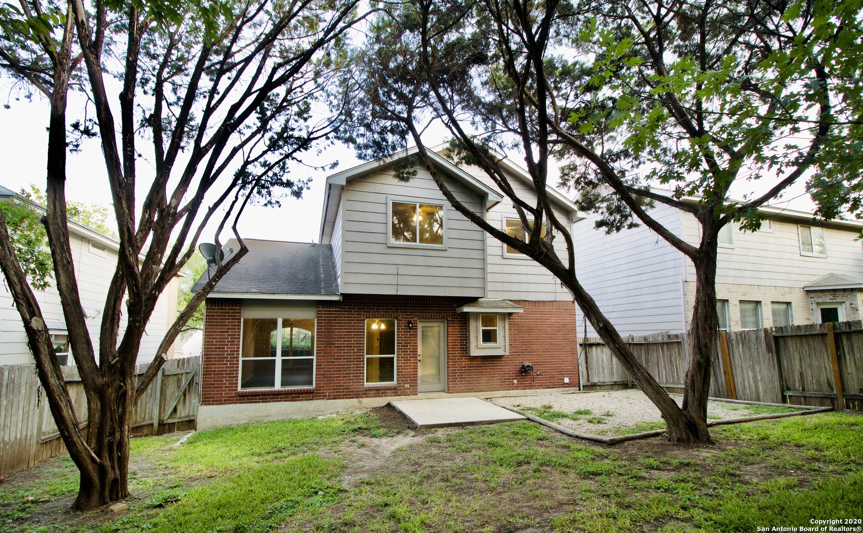 7 Claybrook San Antonio, TX 78254 - Photo 21 of 21 a front view of a house with a yard