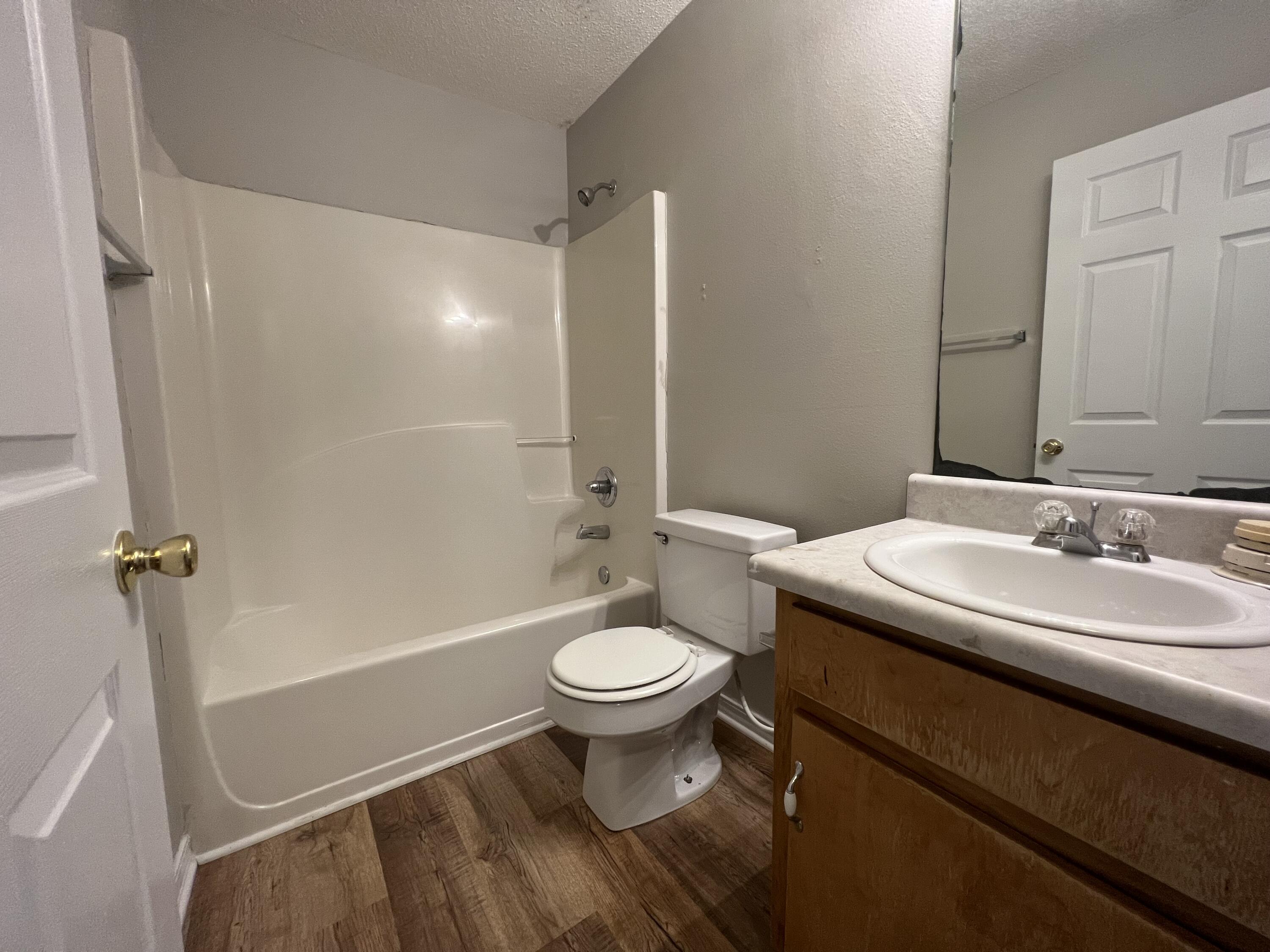 232 Runnymeade Drive Crestview, FL 32539 - Photo 9 of 11 a bathroom with a sink a toilet and shower