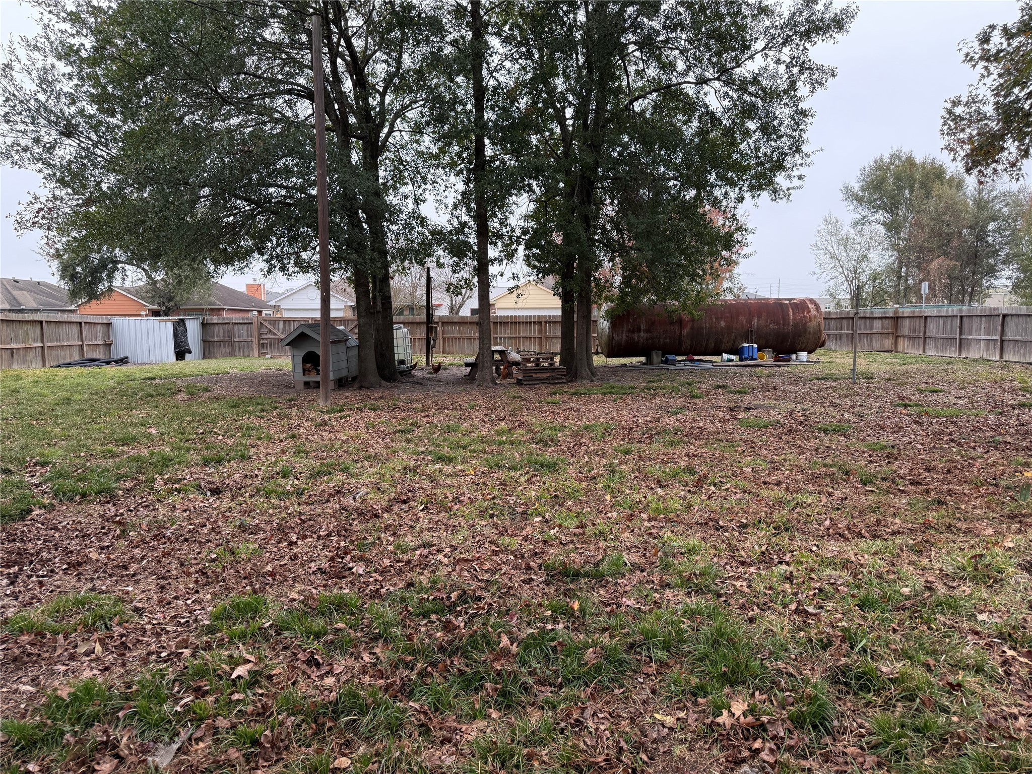 3003 Vega Houston, TX 77088 - Photo 2 of 13 a house with trees in front of it