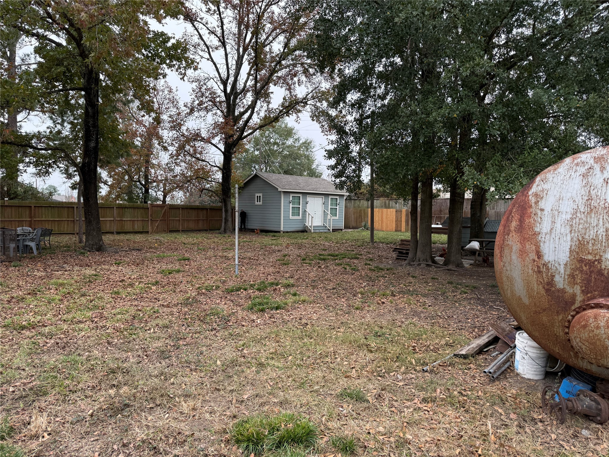 3003 Vega Houston, TX 77088 - Photo 6 of 13 a view of a house with backyard