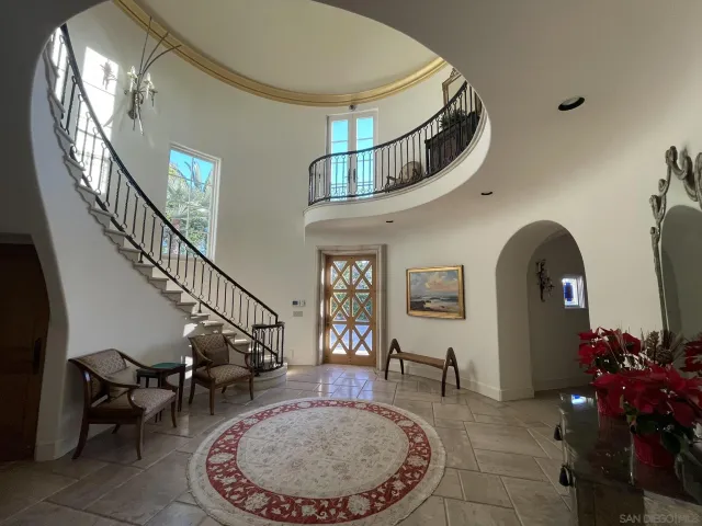 a room with furniture and a flat screen tv
