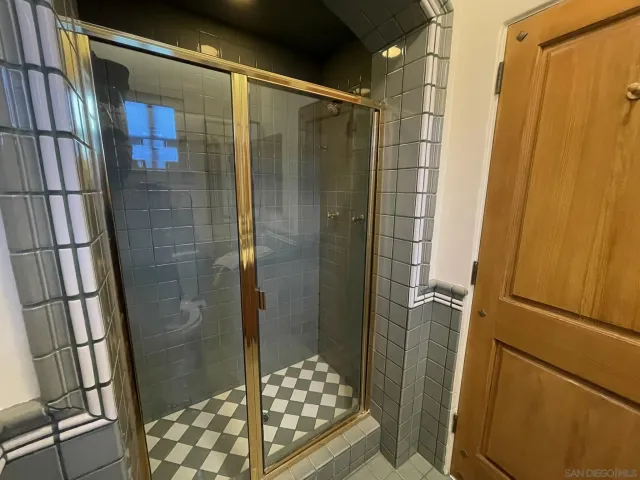 a view of a dining room with furniture wooden floor and chandelier