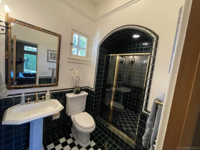 a view of a patio with a table and chairs