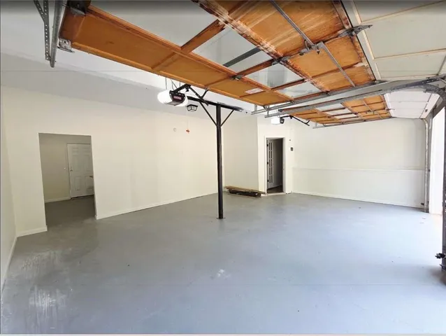 a view of a room with wooden walls