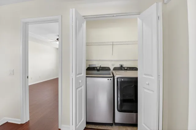 a utility room with washer and dryer