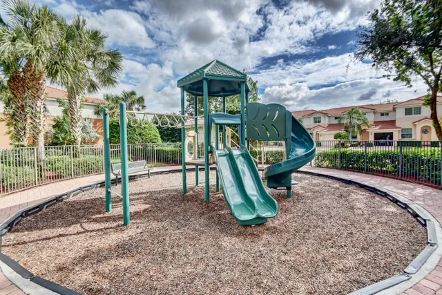 a front view of a house with garden equipment