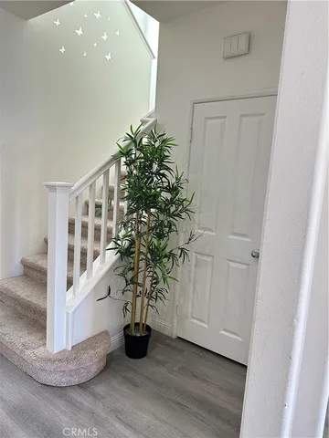 a view of entryway with wooden floor