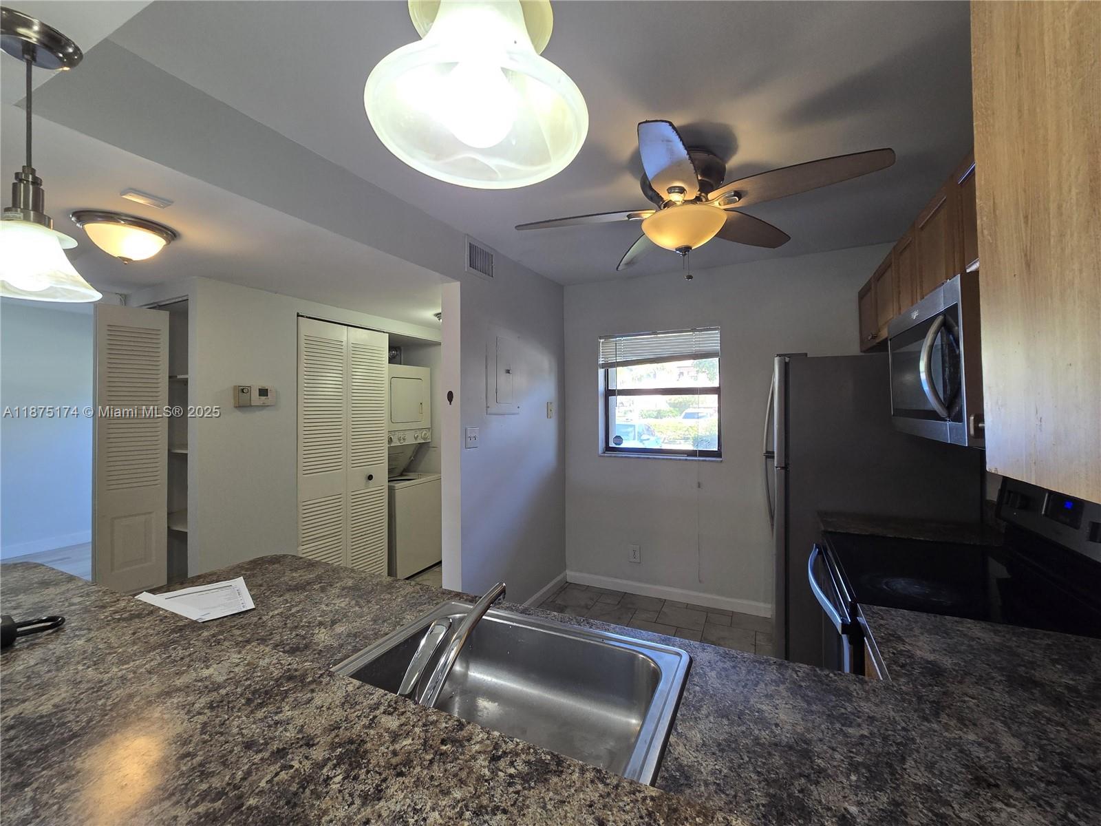 10600 Northwest 10th Street, Unit 106 Pembroke Pines, FL 33026 - Photo 8 of 17 a very nice looking room with a couch