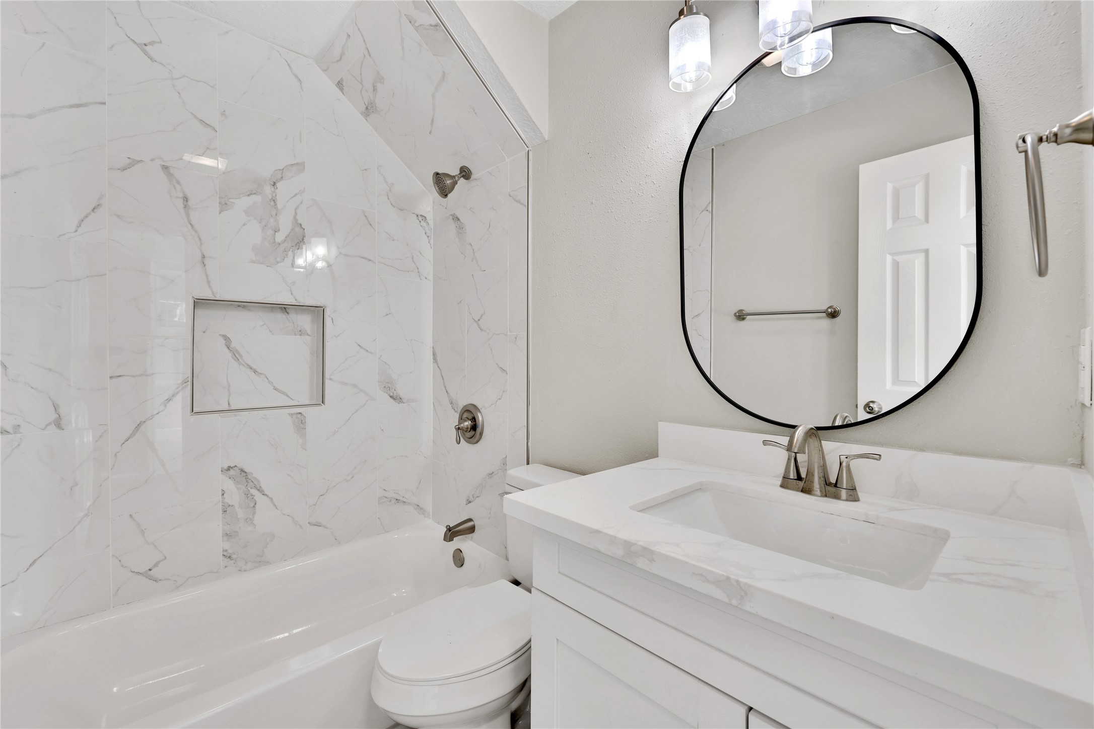 31 Montego Way Point Blank, TX 77364 - Photo 23 of 23 a bathroom with a sink a toilet and a mirror