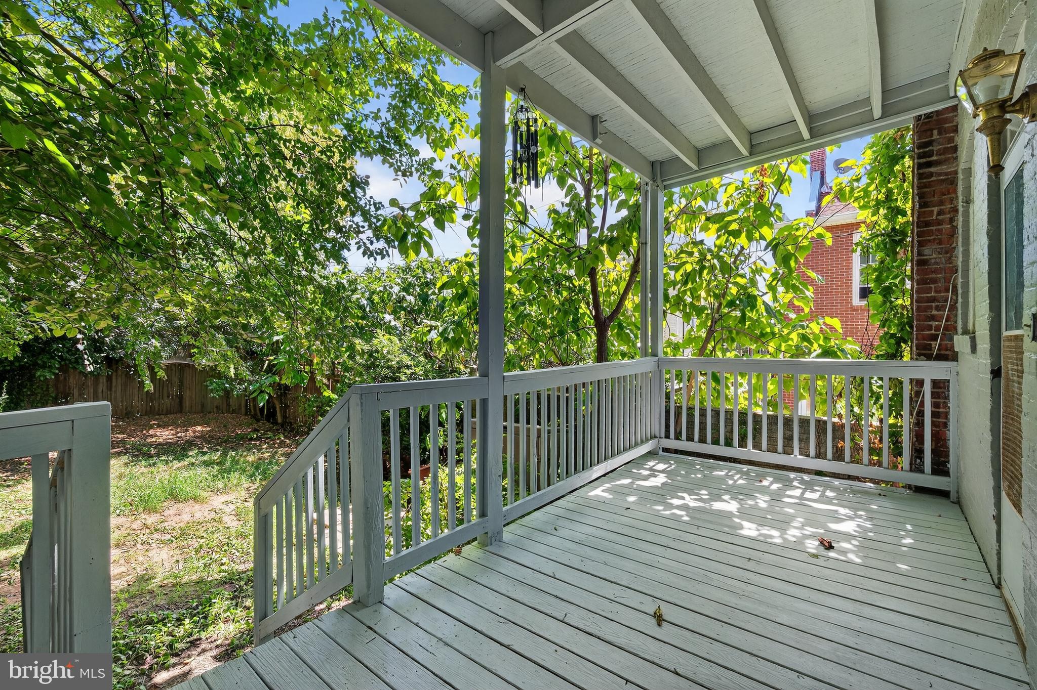 3523 Warder Street Northwest Washington, DC 20010 - Photo 27 of 30 a view of balcony with wooden floor