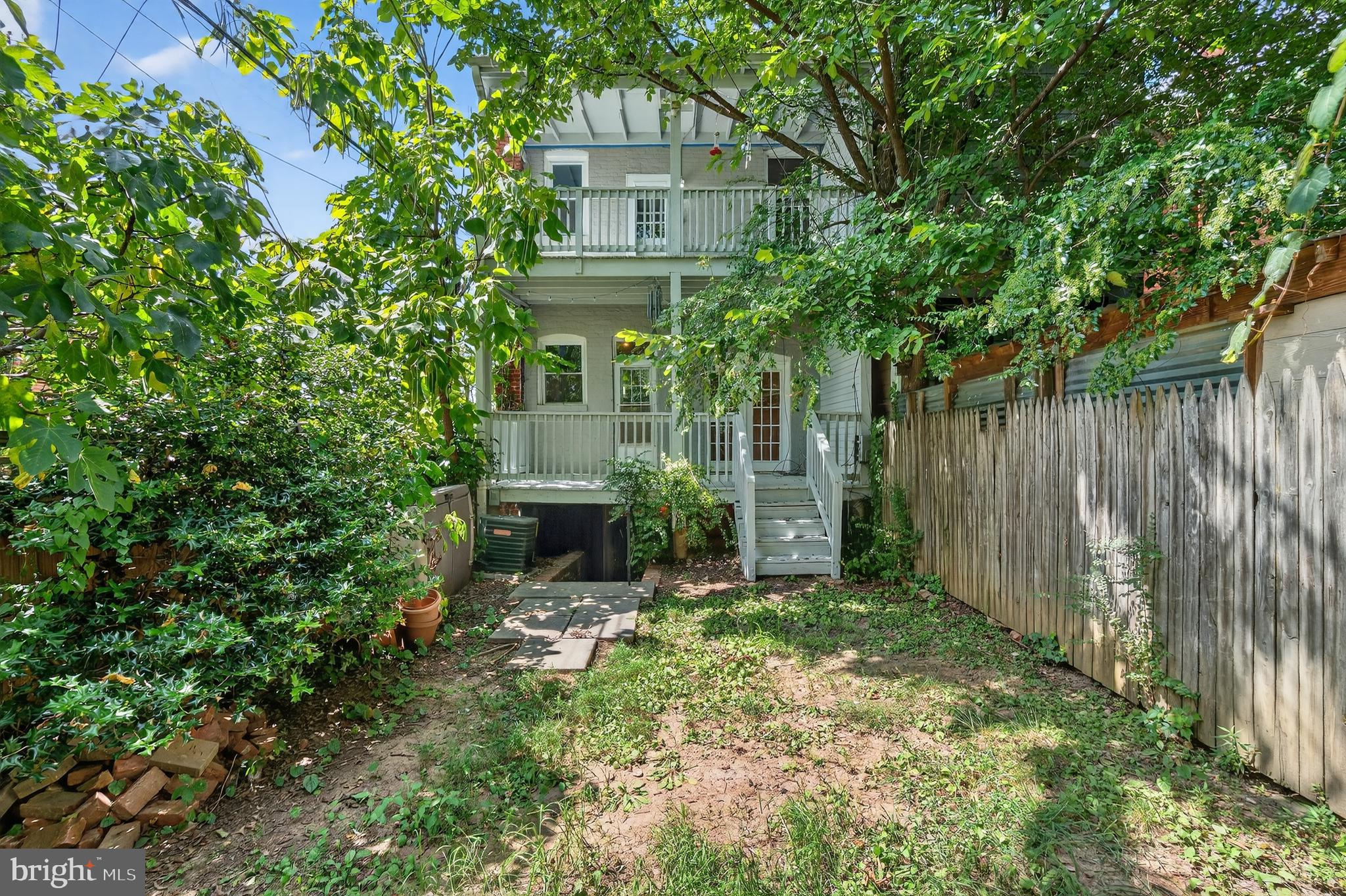 3523 Warder Street Northwest Washington, DC 20010 - Photo 28 of 30 a view of a house with a yard and sitting area