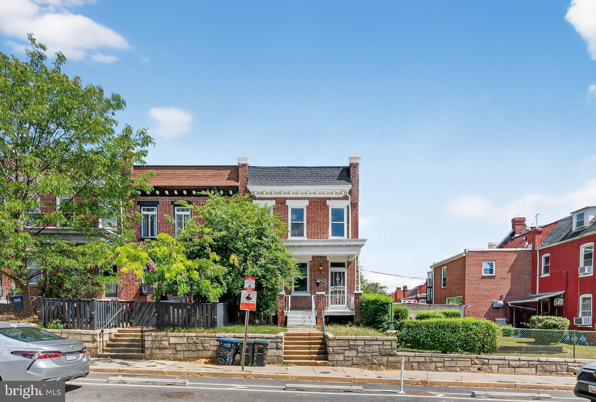 3523 Warder Street Northwest Washington, DC 20010 - Photo 30 of 30 a front view of a house with a yard