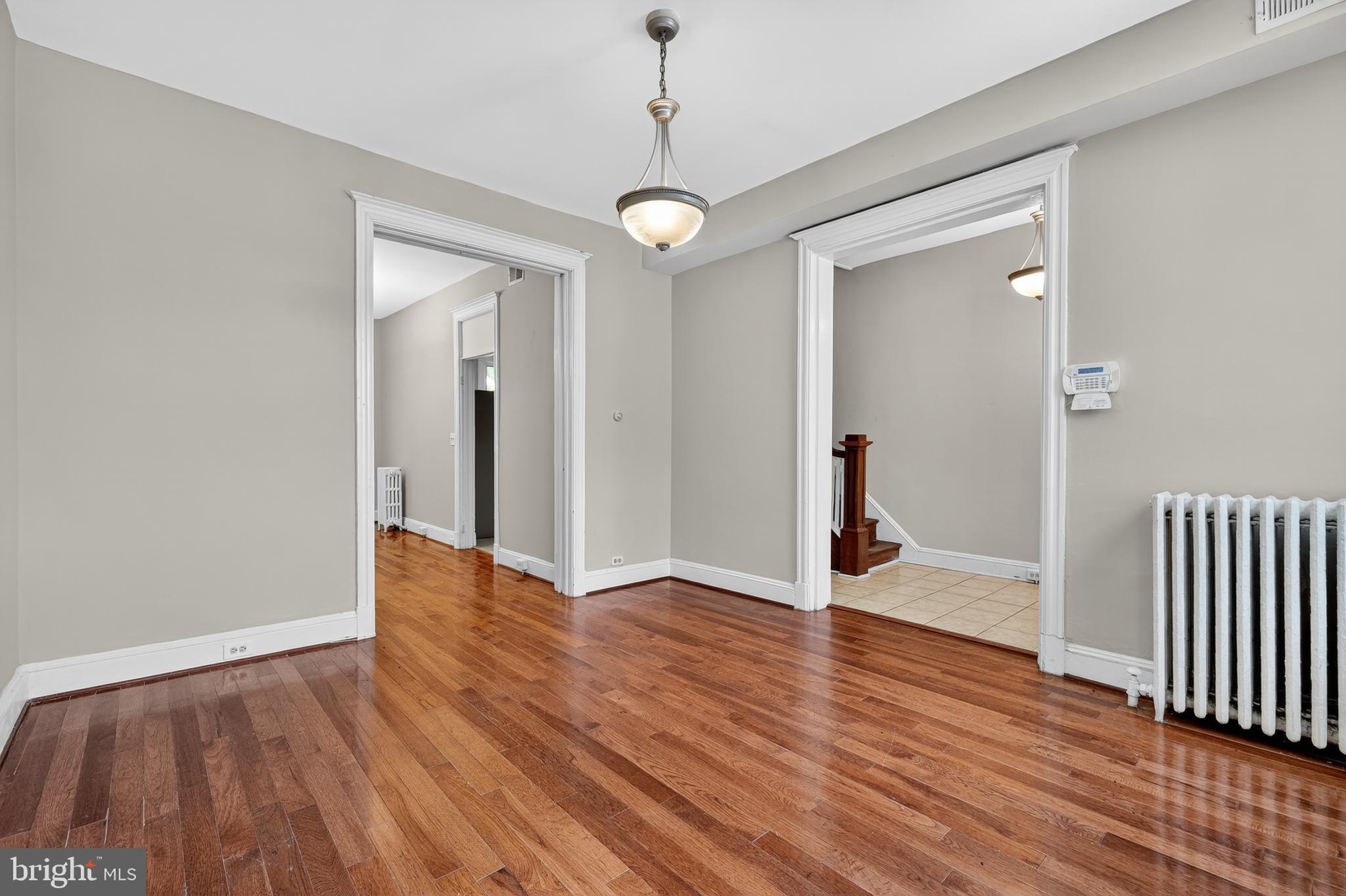 3523 Warder Street Northwest Washington, DC 20010 - Photo 4 of 30 a view of a room with wooden floor