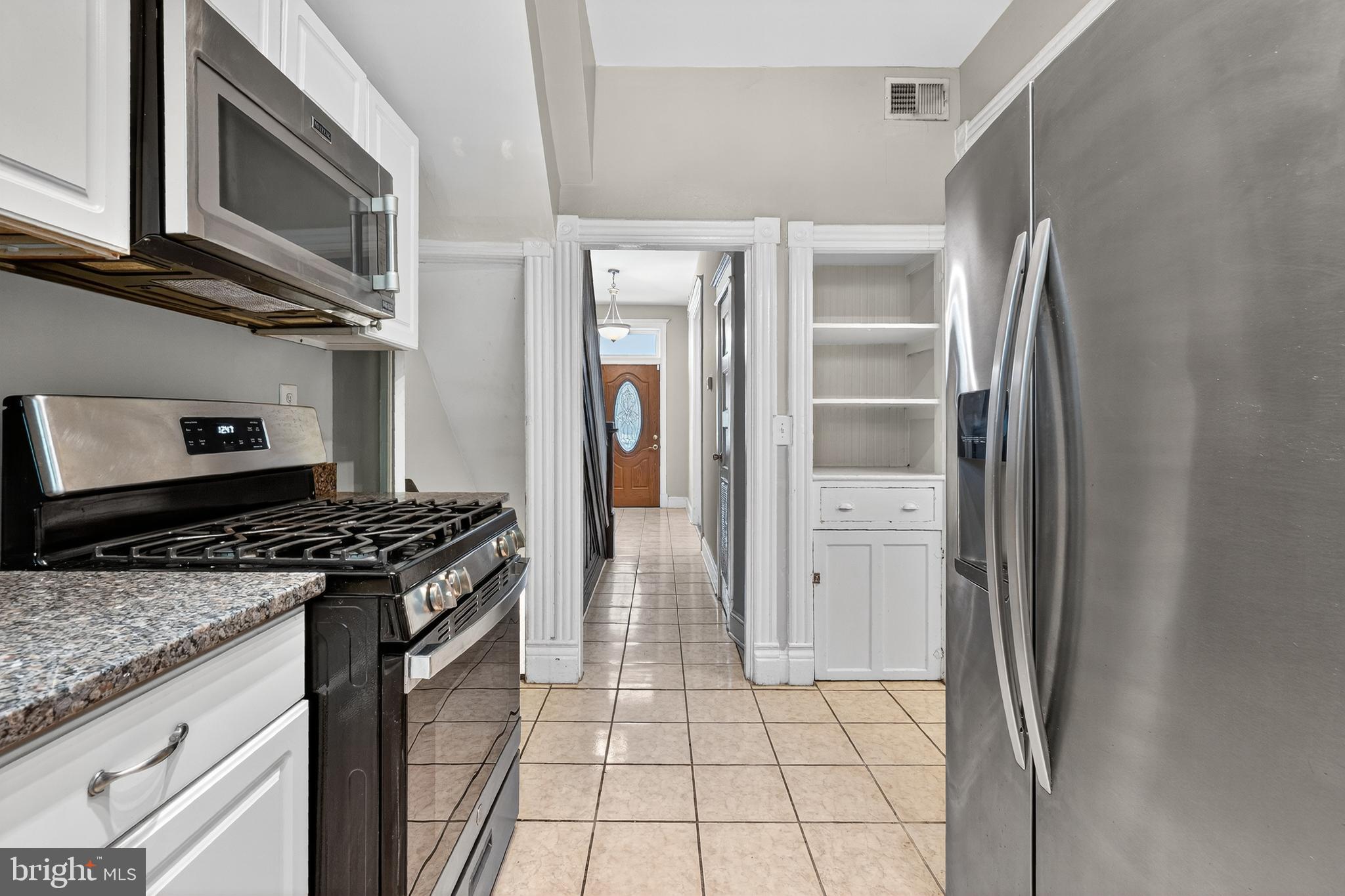 3523 Warder Street Northwest Washington, DC 20010 - Photo 7 of 30 a kitchen with a stove