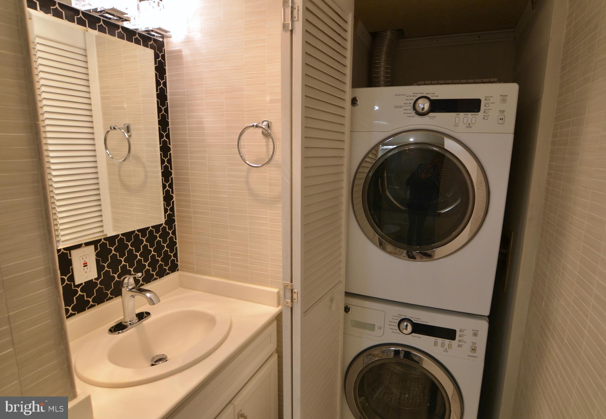 2114 N Street Northwest, Unit 2 Washington, DC 20037 - Photo 21 of 24 a bathroom with a sink and a mirror