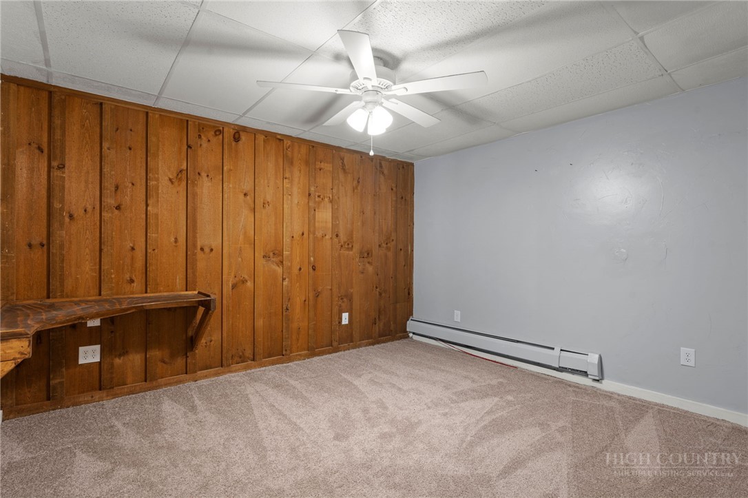 2345 Watauga River Road Sugar Grove, NC 28679 - Photo 30 of 50 an empty room with fan and windows