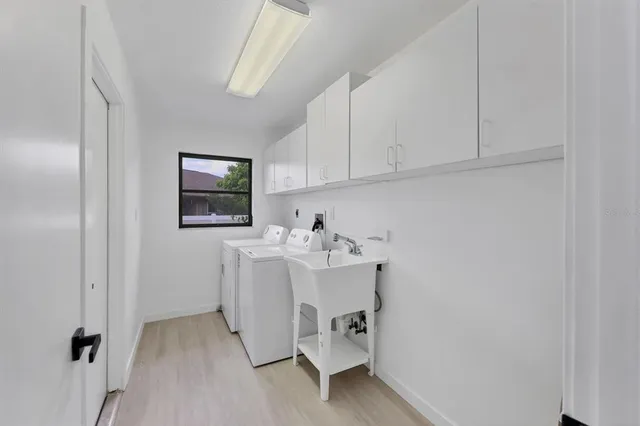 a view of cabinets with sink