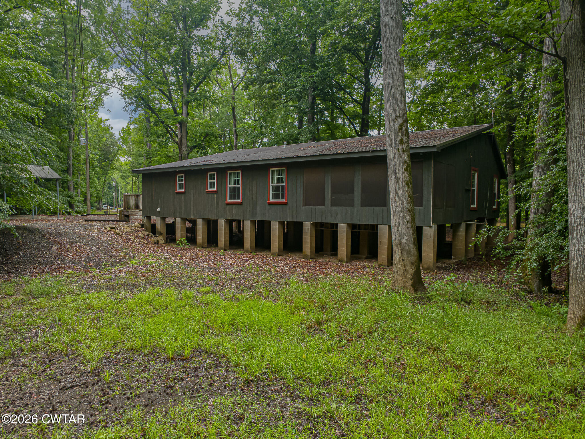 445 Wesley Lake Road Brownsville, TN 38012 - Photo 6 of 21 a view of a house with a yard